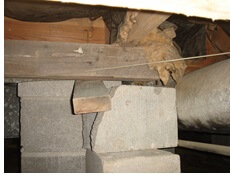 Failing support beams under crawl space