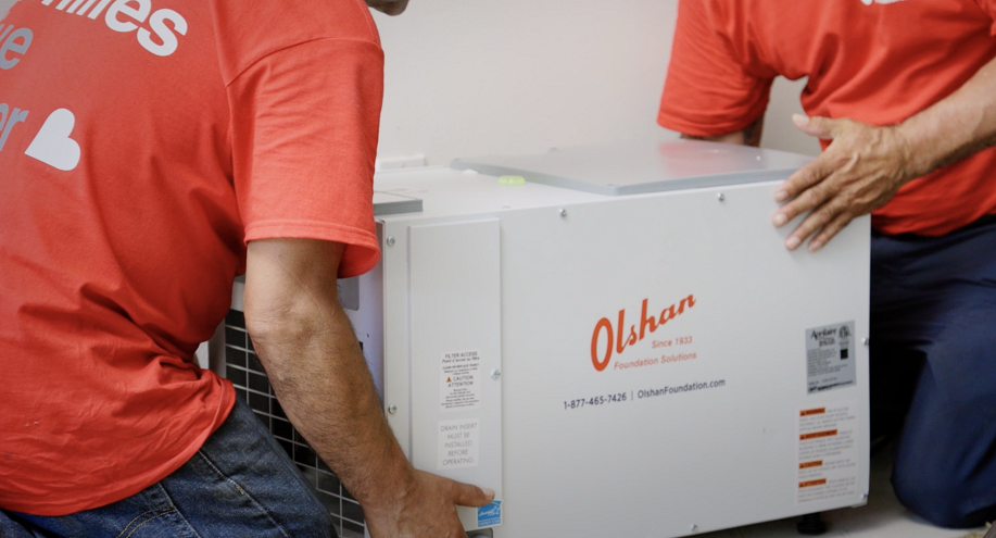 crawl space dehumidifier installed under home by olshan