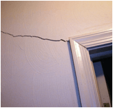 crack above door